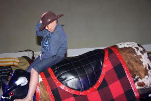 Holidays 10 - What are they doing on the bull ?